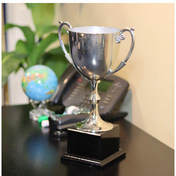 Silver Metal Cup on Black Base